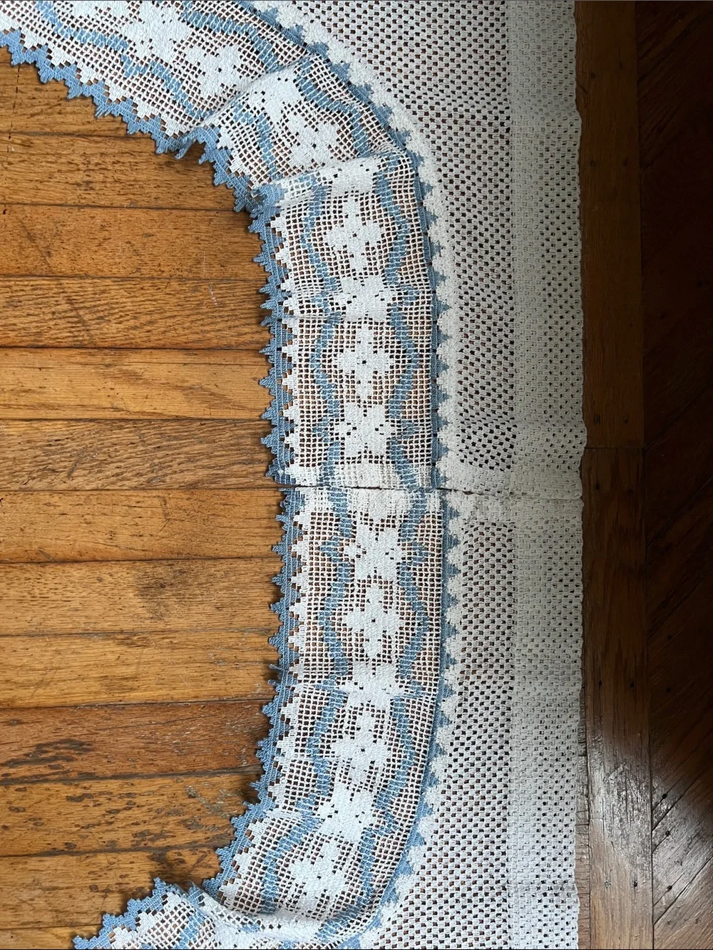 Set of curtain swags with Blue Trim.